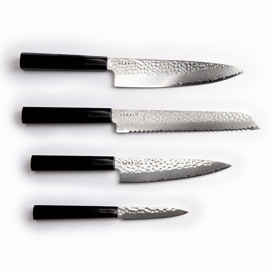 4 knives with white background